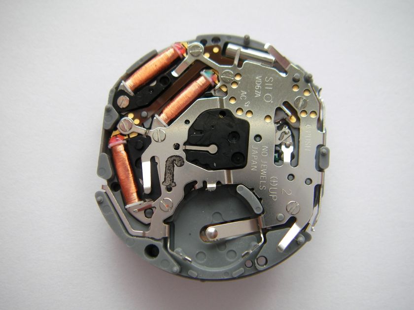 Sjiojiri VD67A N.O.S. chronograph 3 register watch movement with date 