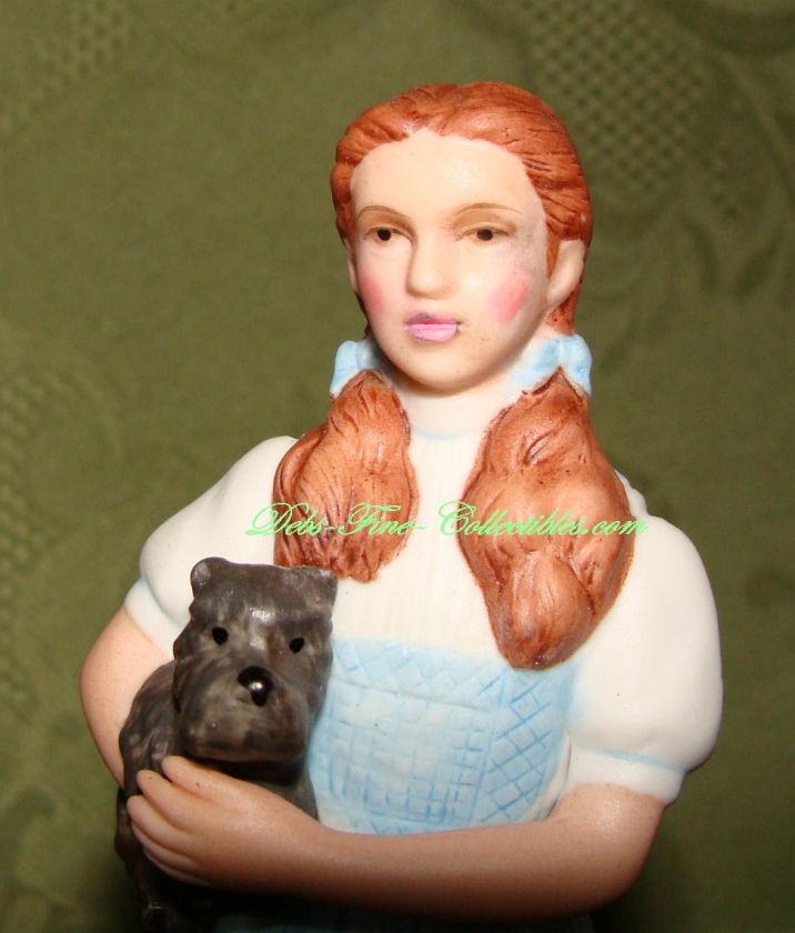   figurine depicting Judy Garland as Dorothy in The Wizard of Oz