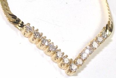   Shaped Diamond and Gold Snake Chain Necklace for your bidding today